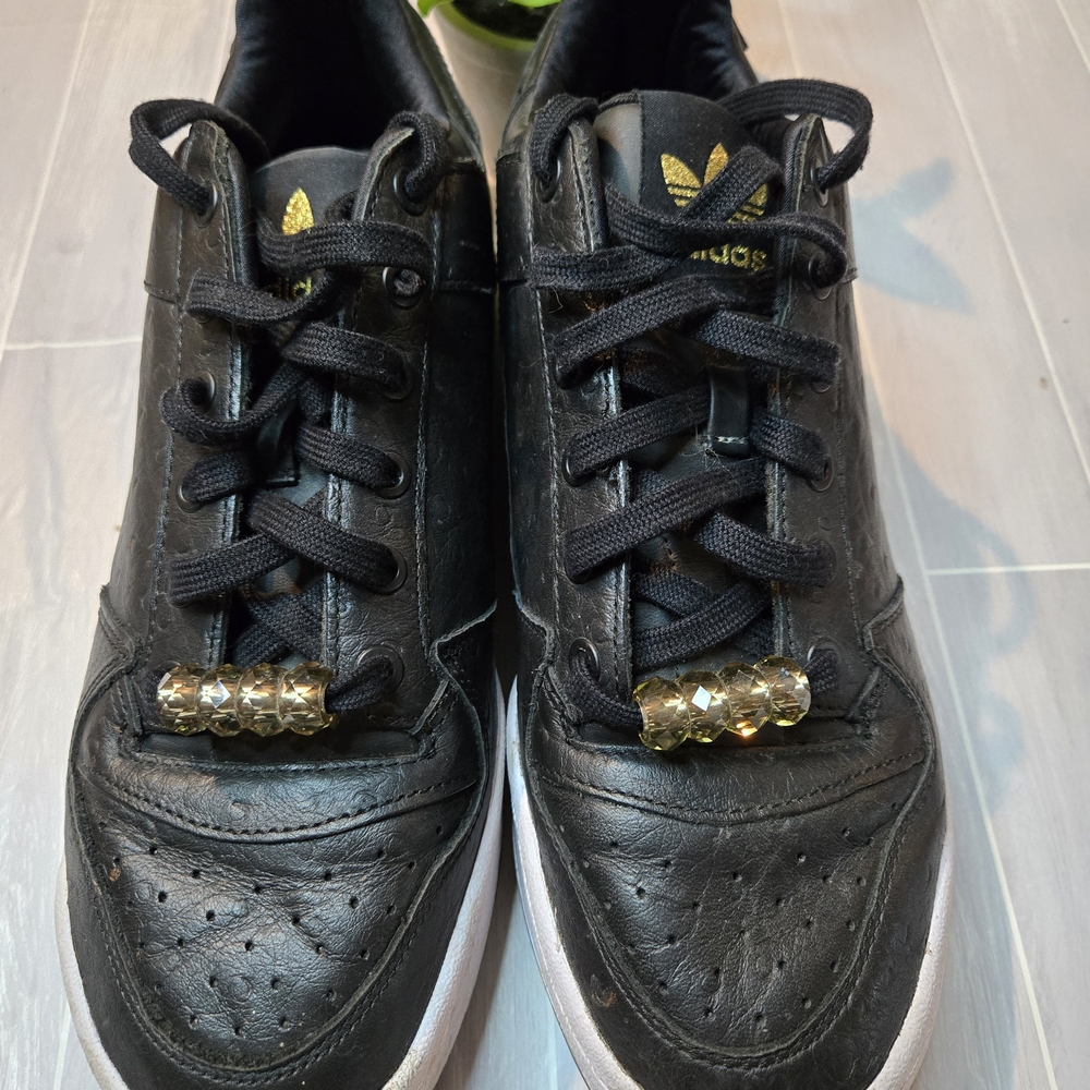 Adidas Black and Gold Sneakers